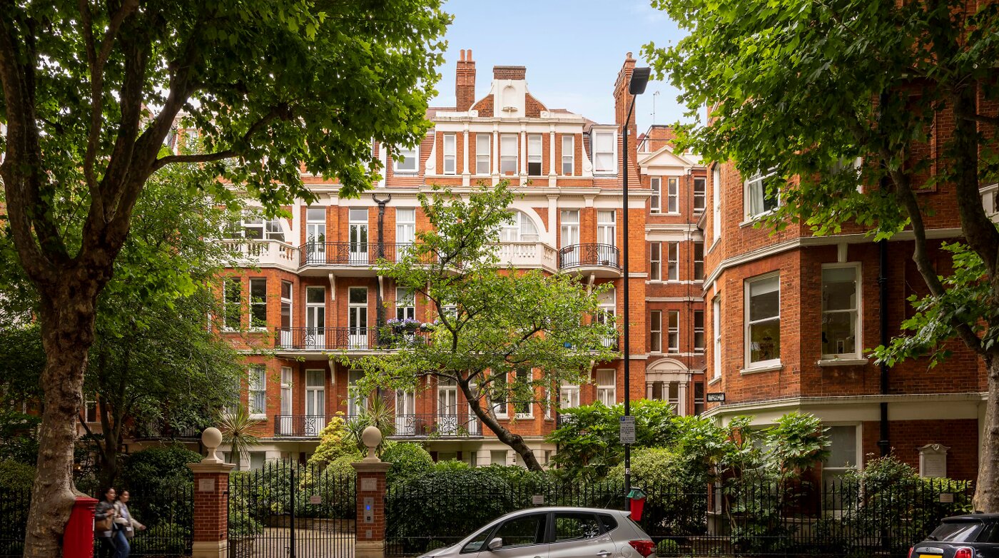 Red brick mansion block facade