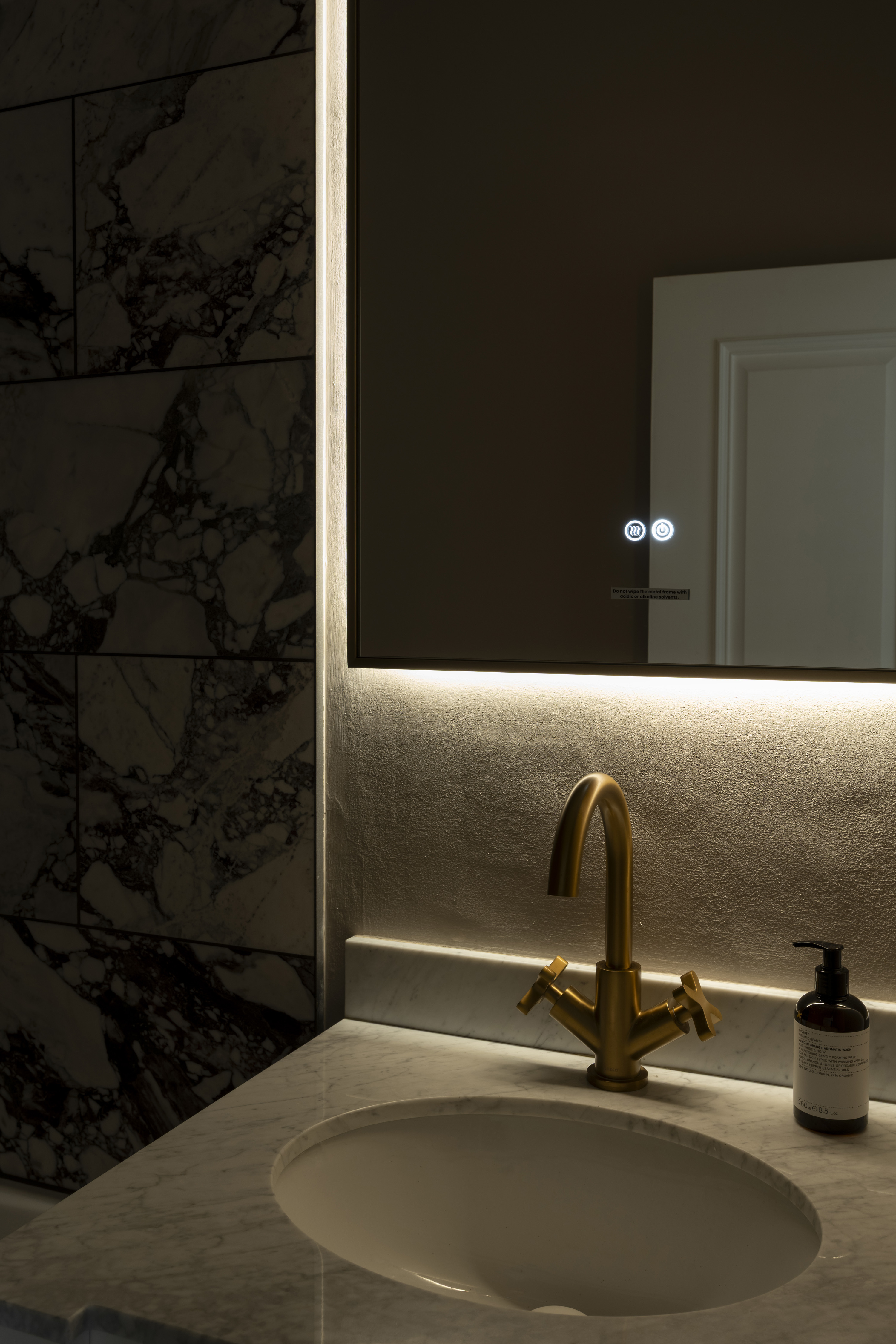 Bathroom with veined marble